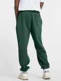 New Balance Pantalone Tuta Essentials Fleece Uomo MP41503 Nightwatch Green - Verde