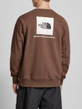 The North Face Felpa Raglan Box Nse Crew Uomo NF0A89FA Smokey Brown - Marrone